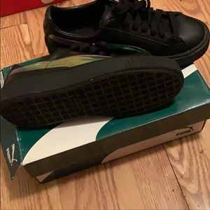 pumas black and iridescent